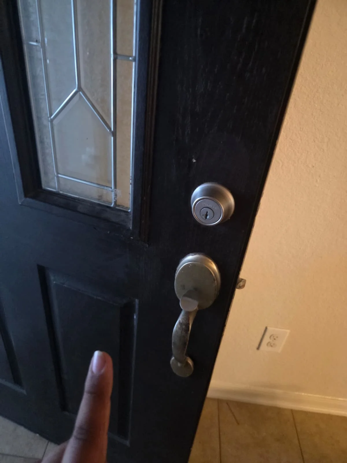 exterior home locks checked after buying a house, real company service photo 1
